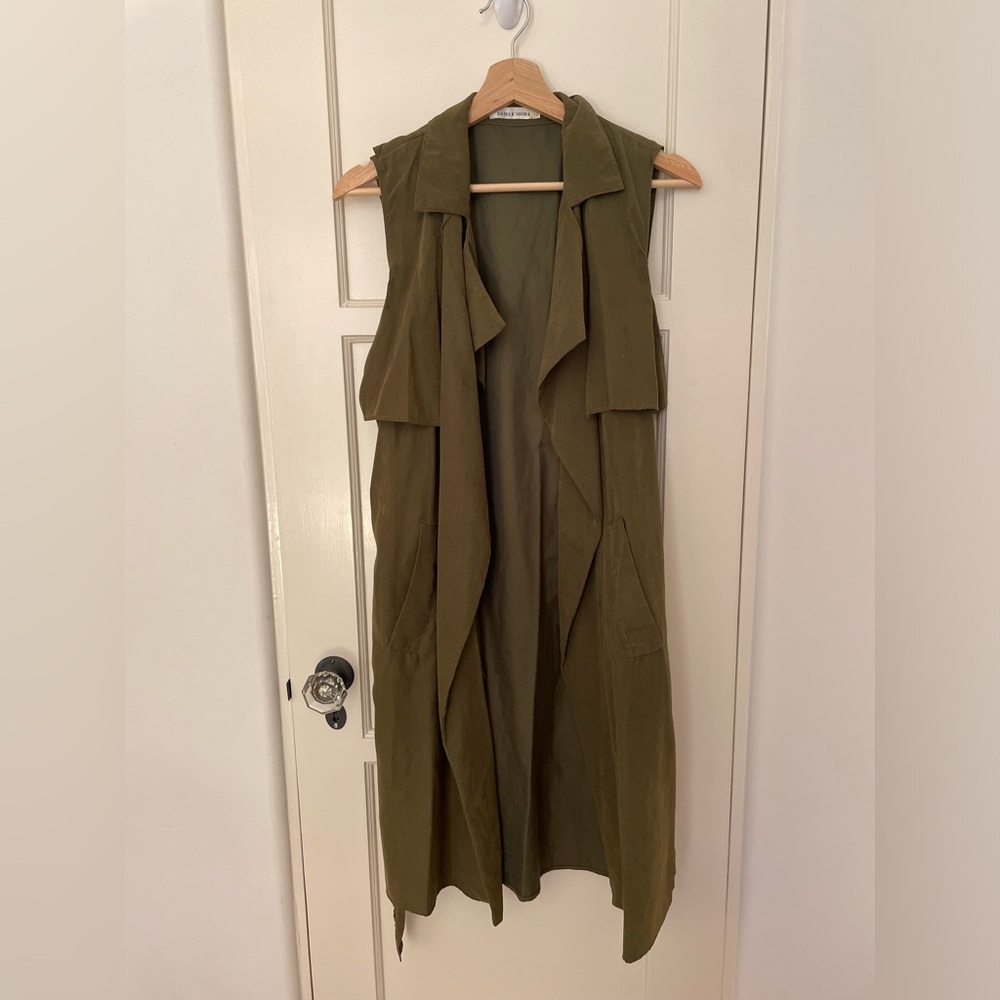Sleeveless green jacket